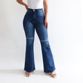 Flare jeans regular azul rasgado